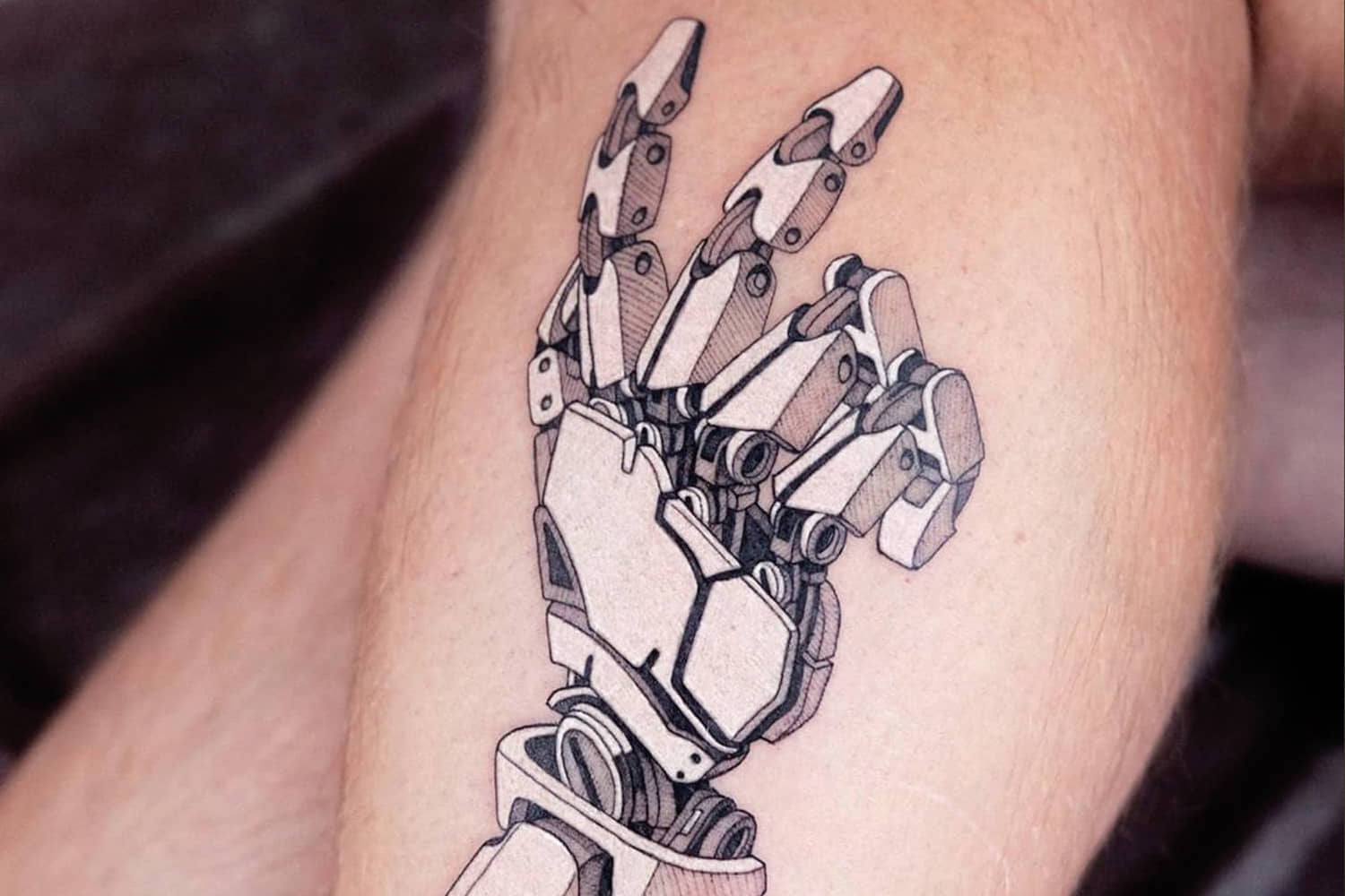 robotic hand tattoo