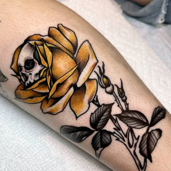 skull in rose tattoo