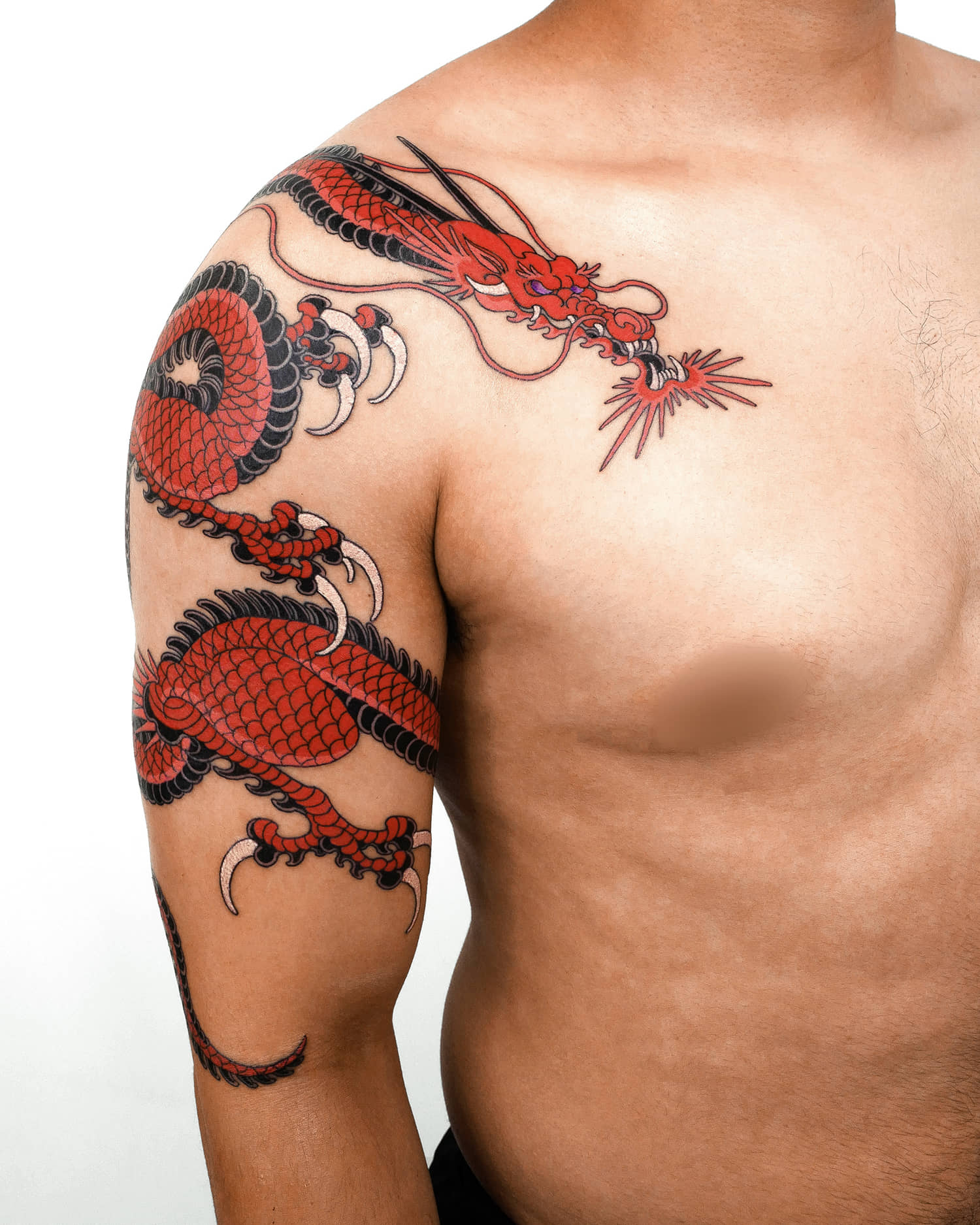 Red dragon on shoulder tattoo