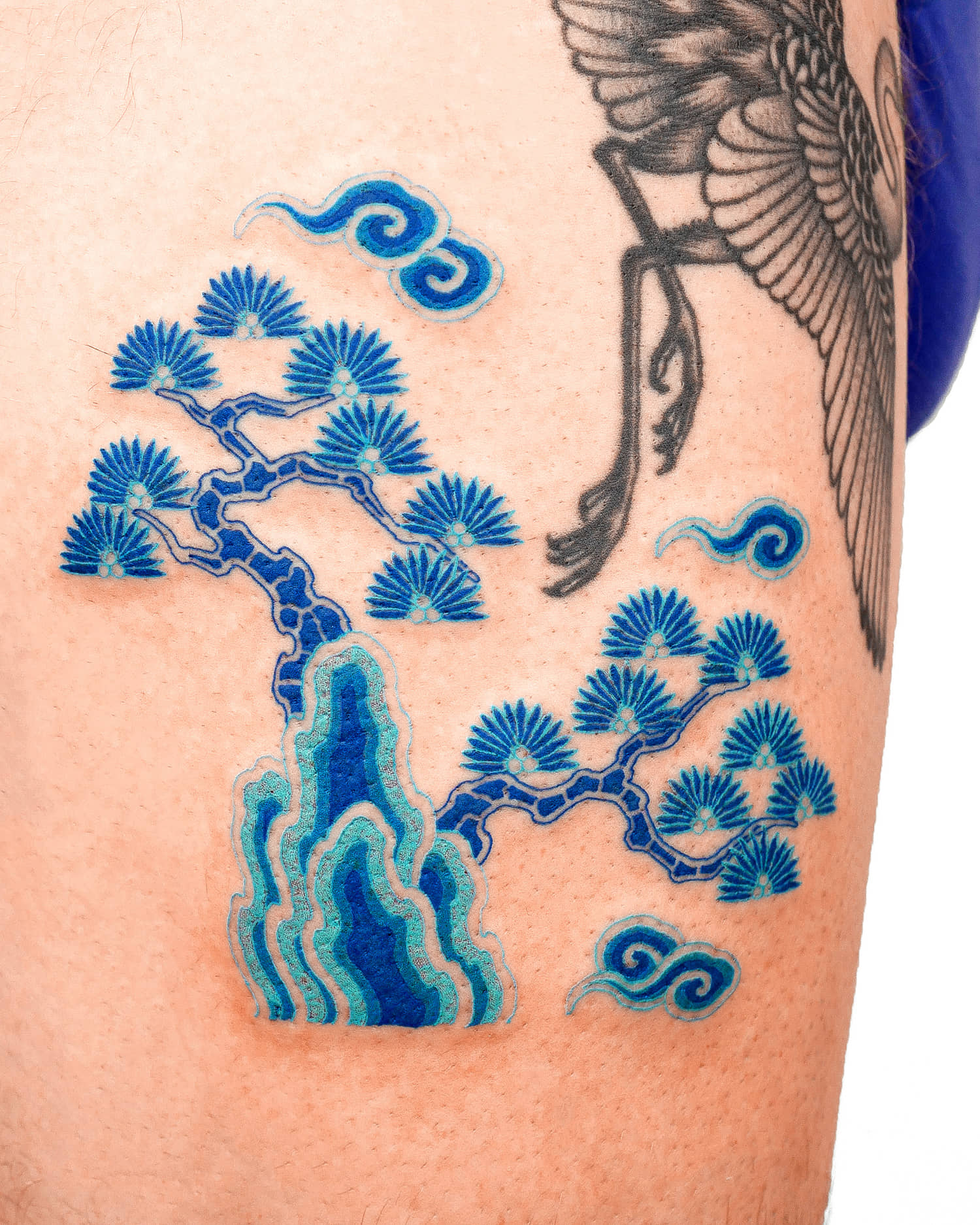 Tree and mountain, East Asian tattoo in blue style