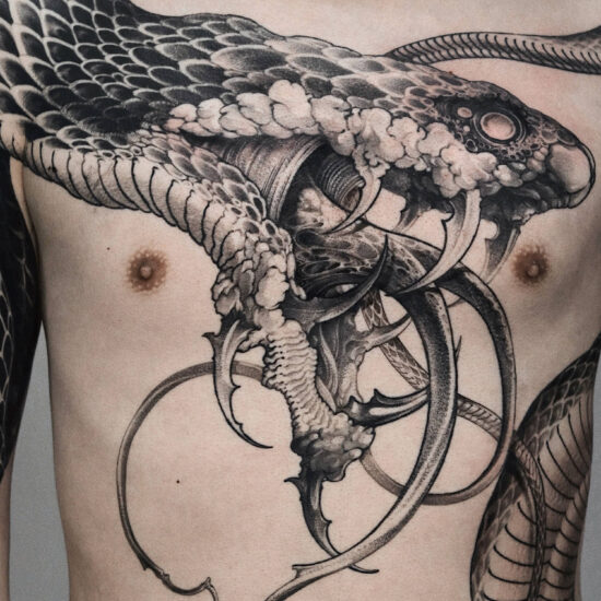 snake tattoo by uncogrim