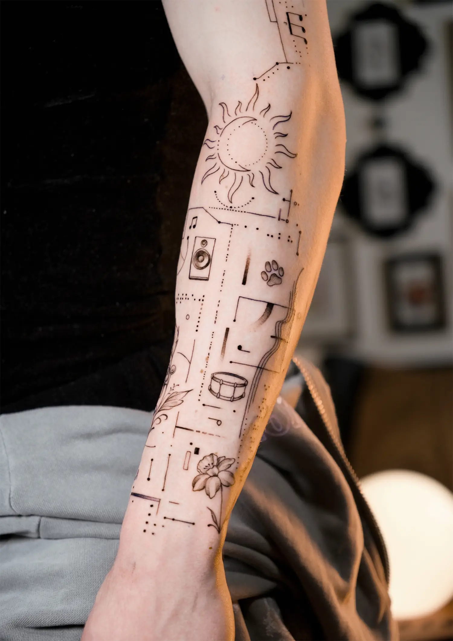 cycle of night and day, braille and bible verses tattooed on arm