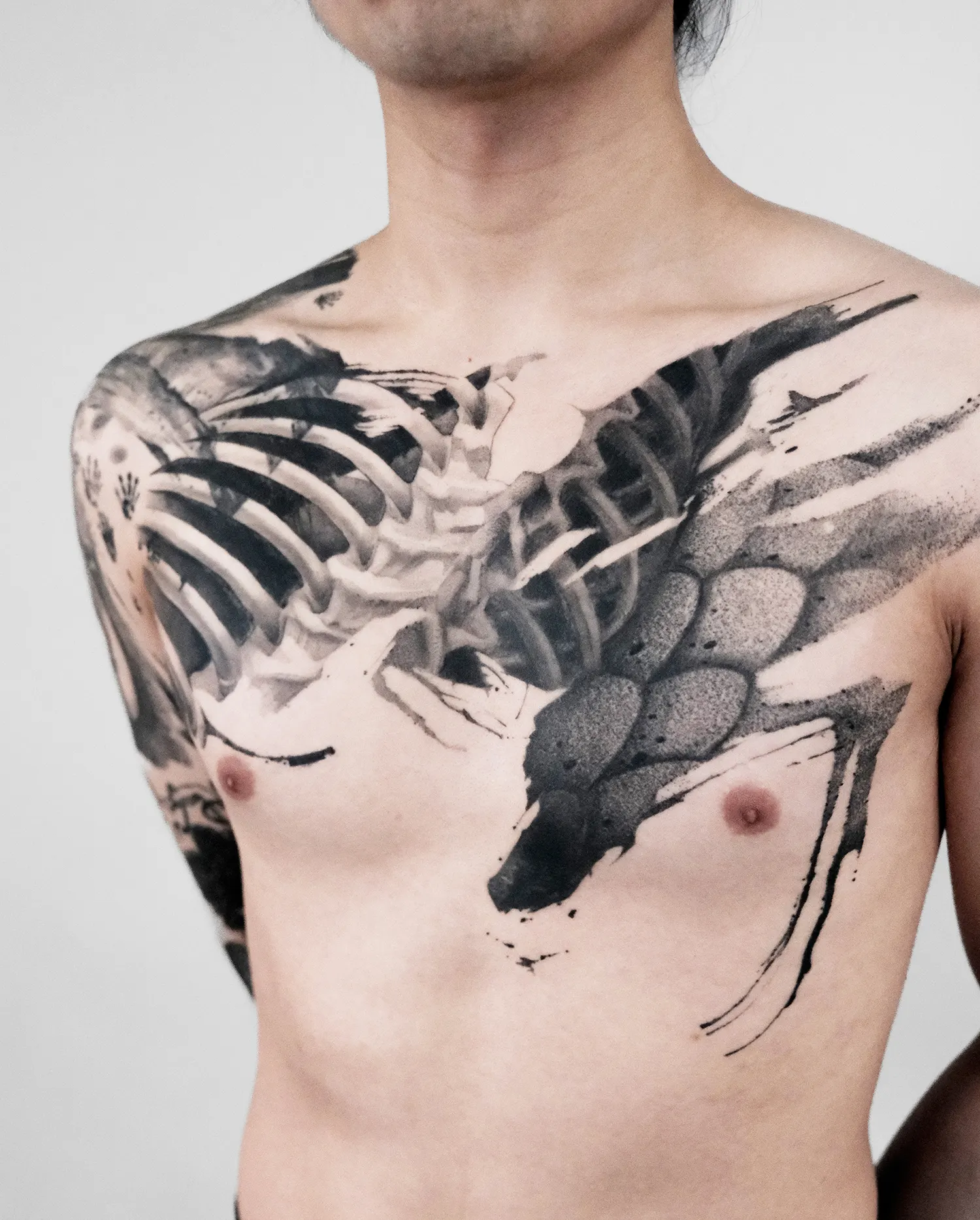 abstract rib cage tattoo