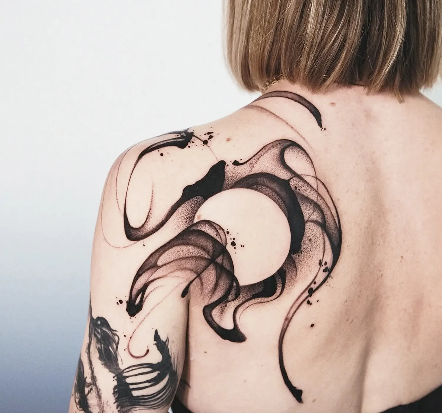 balance in chaos, moving ink on shoulder tattoo by ryu