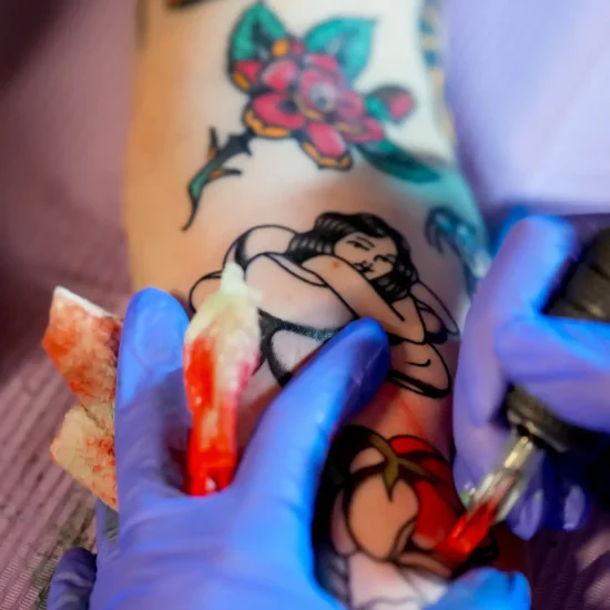 lady tattoo on arm