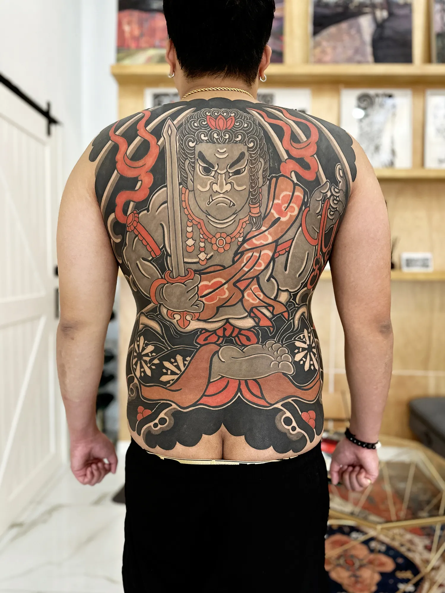 The deity Fudo Myoo embodies discipline, bravery, and inner resolve as it annihilates ignorance and evil