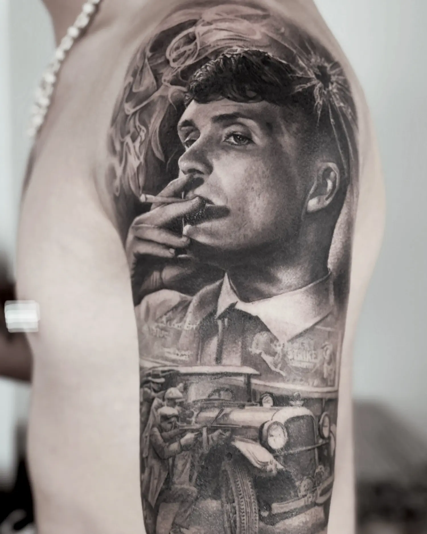 cillian murphy portrait, from peaky blinders, smoking. tattoo in black and gray