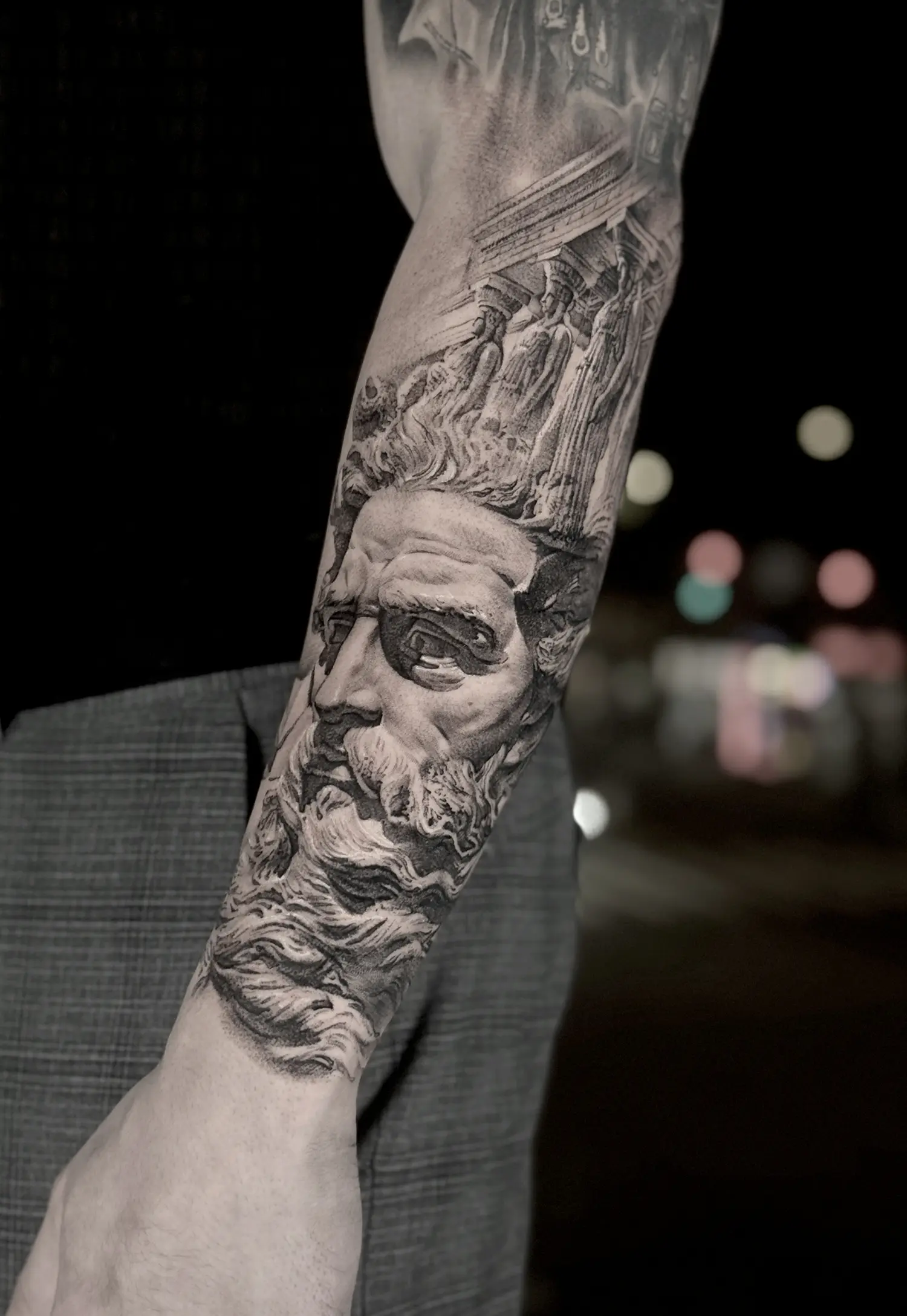 greek sculpture tattoo on arm, with columns by bk