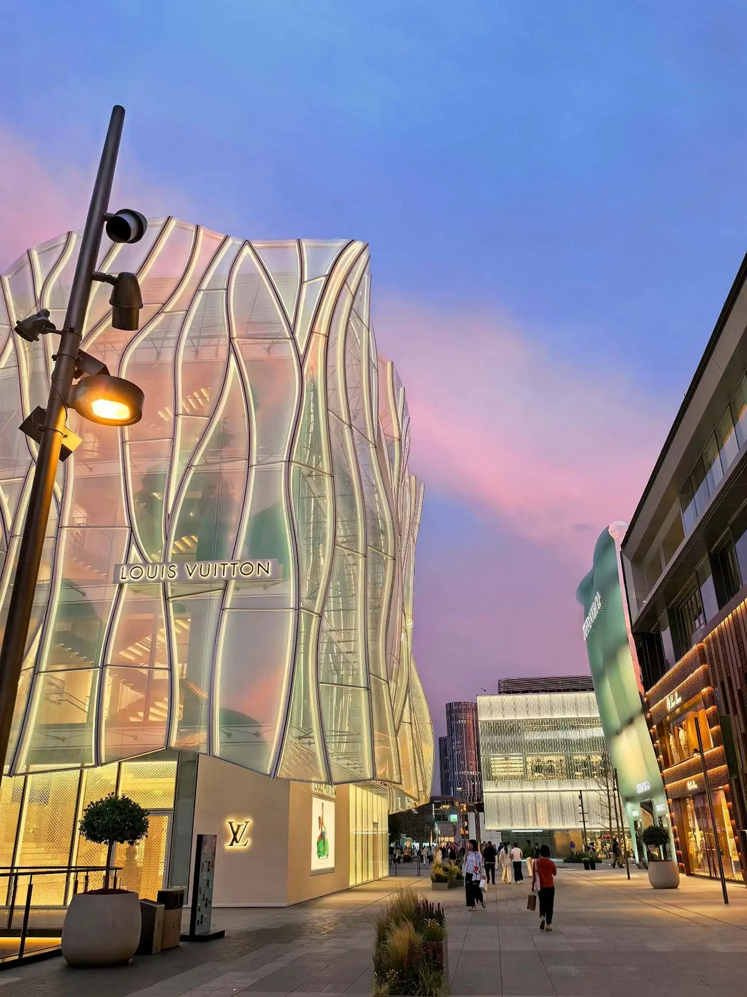 Beijing modern urban renewal replaced older informal street markets with a luxury and dining hub in Sanlitun to improve safety and the local economy
