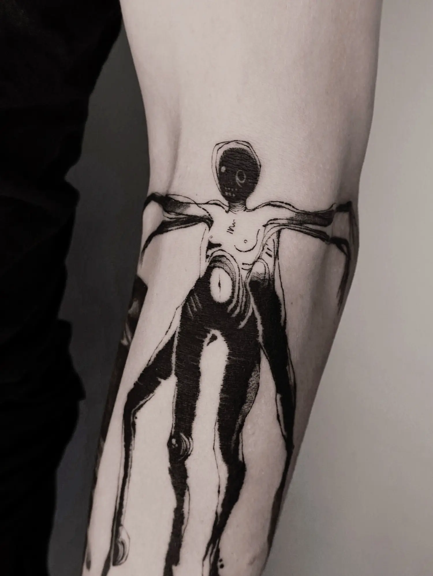 four legged character, humanoid, black ink tattoo