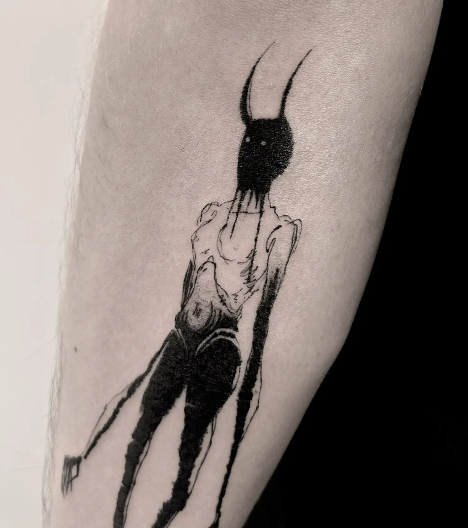 demon like form, titled black form, black ink tattoo