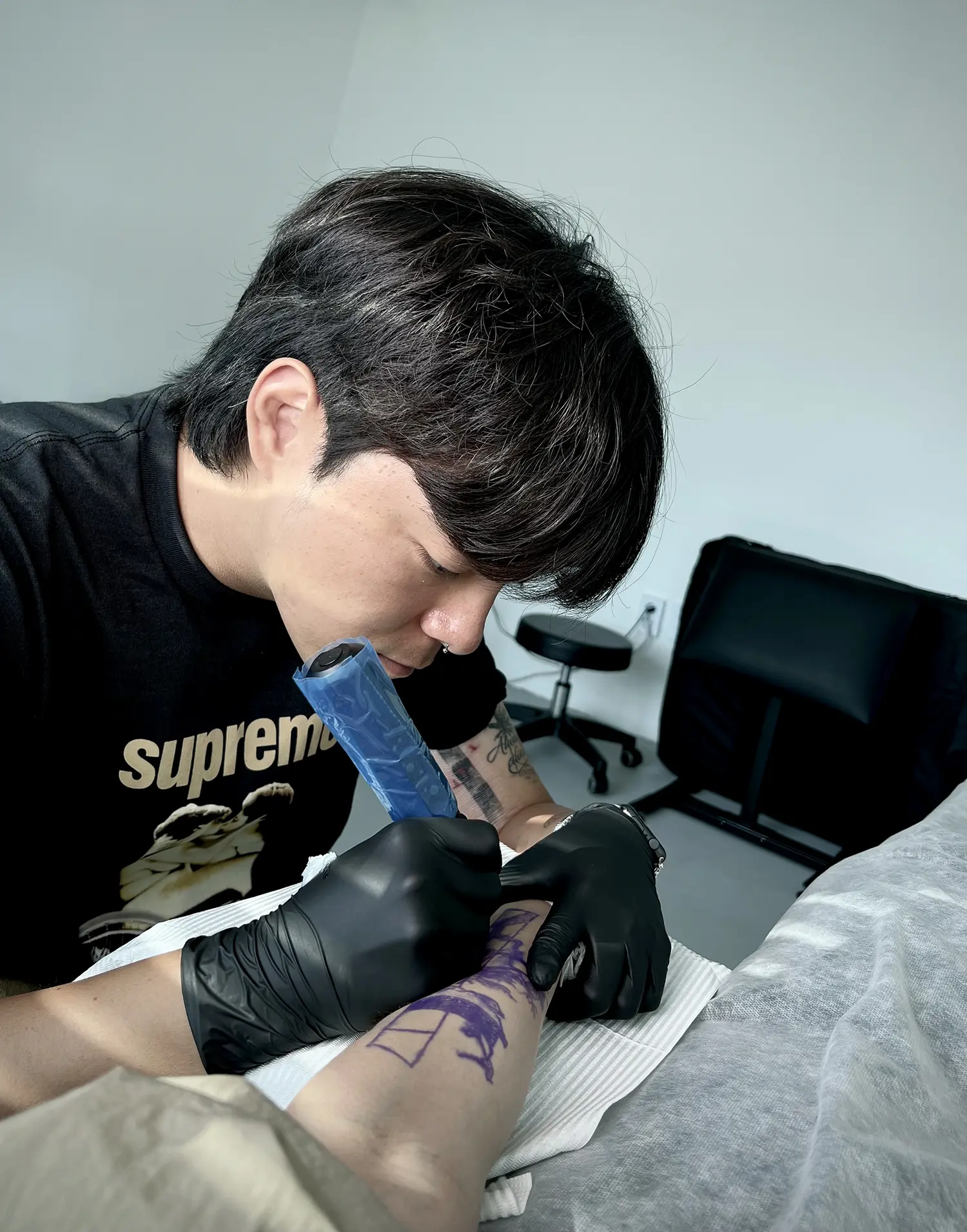 Gentle buzz of the machine, precision--Myungdo is completely in his flow state.